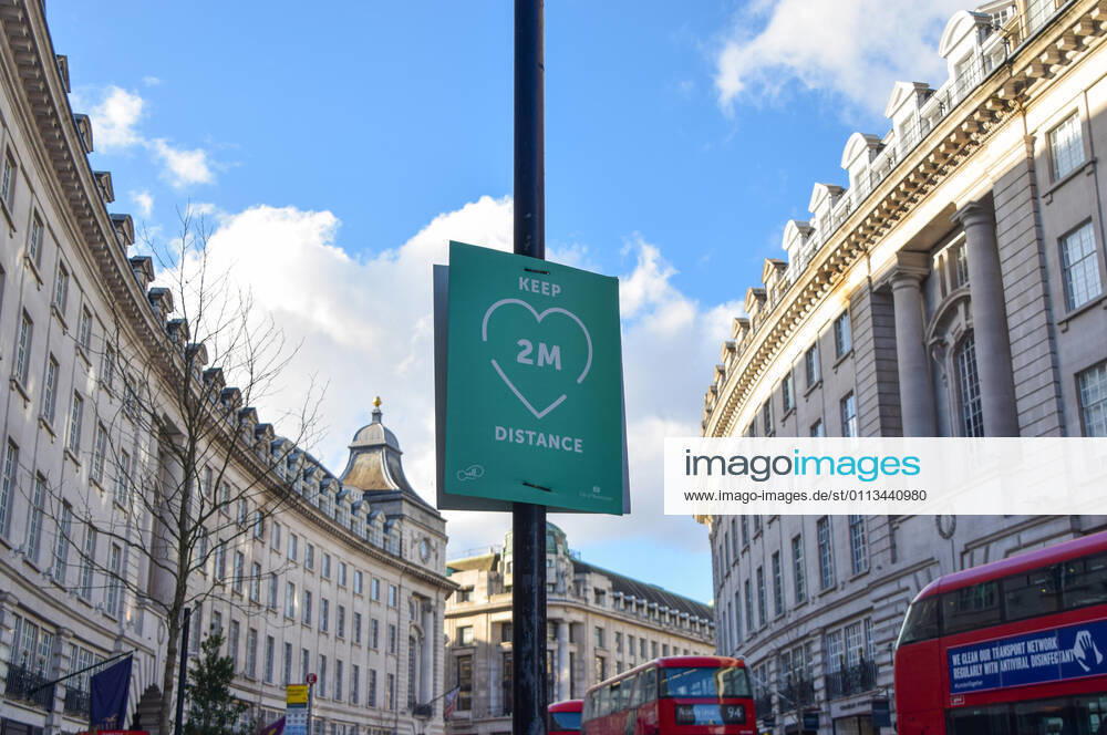 The Keep 2 Meters Distance sign seen on Regent Street in London..Coronavirus cases are falling across the UK, as the government prepares to present its plan for easing the lockdown restrictions. London United Kingdom - ZUMAs197 20210218_zaa_s197_196