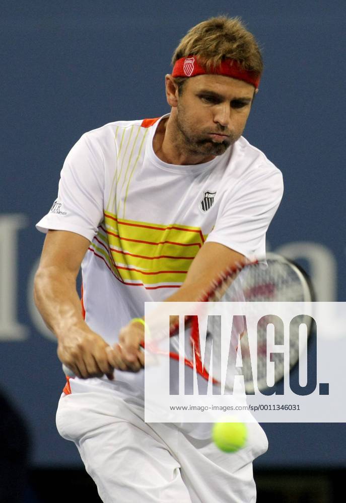 Mardy Fish, USA, returns in the first set of third-round action at the 2012 U.S. Open held at the National Tennis Center on September 1, 2012. NYP20120901333