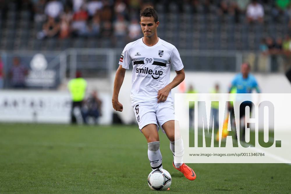Bruno Teles of Vitoria of Guimaraes controls the ball in a match against GD Estoril Praia at the Portuguese League 3rd Round in Estadio D. Afonso Henriques in Guimaraes.