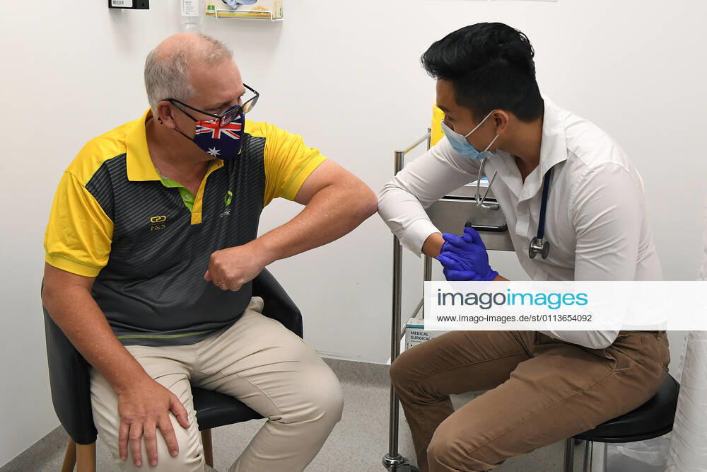 SCOTT MORRISON COVID19 VACCINATION, Australian Prime Minister Scott Morrison receives his COVID-19 vaccination during a visit to Castle Hill Medical Centre to preview the COVID-19 vaccination program on Sunday, February 21, 2021. The PM has received a COVID-19 vaccination, joining a small group of people who are the first in Australia to receive a jab. ( NO ARCHIVING, , NO USE IN BOOKS WITHOUT CONSENT SYDNEY NSW AUSTRALIA