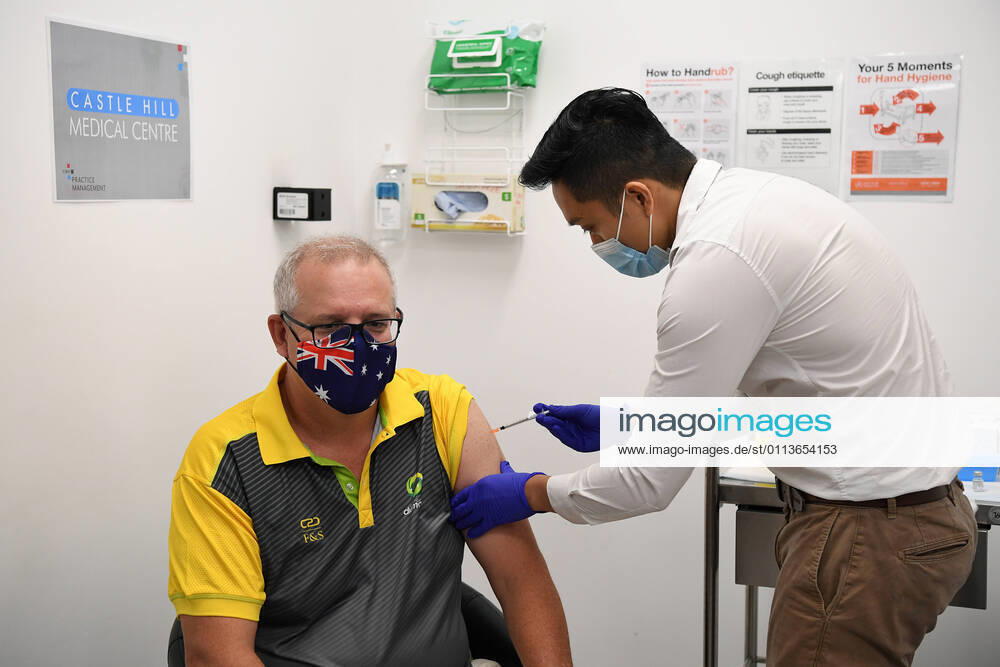 SCOTT MORRISON COVID19 VACCINATION, Australian Prime Minister Scott Morrison receives his COVID-19 vaccination during a visit to Castle Hill Medical Centre to preview the COVID-19 vaccination program on Sunday, February 21, 2021. The PM has received a COVID-19 vaccination, joining a small group of people who are the first in Australia to receive a jab. ( NO ARCHIVING, , NO USE IN BOOKS WITHOUT CONSENT SYDNEY NSW AUSTRALIA