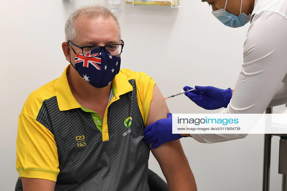 SCOTT MORRISON COVID19 VACCINATION, Australian Prime Minister Scott Morrison receives his COVID-19 vaccination during a visit to Castle Hill Medical Centre to preview the COVID-19 vaccination program on Sunday, February 21, 2021. The PM has received a COVID-19 vaccination, joining a small group of people who are the first in Australia to receive a jab. ( NO ARCHIVING, , NO USE IN BOOKS WITHOUT CONSENT SYDNEY NSW AUSTRALIA