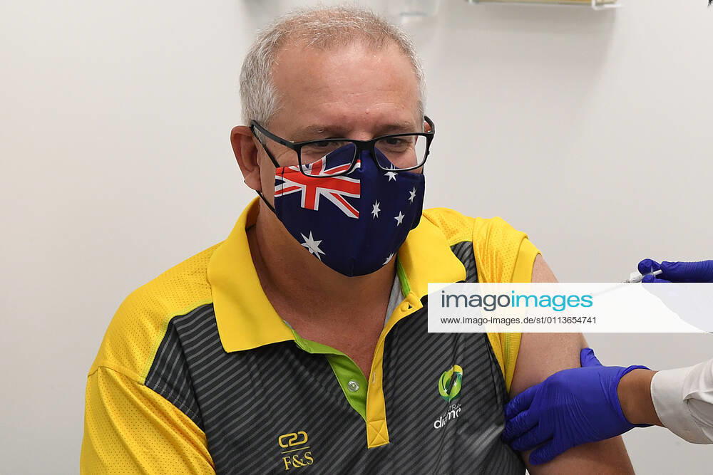 SCOTT MORRISON COVID19 VACCINATION, Australian Prime Minister Scott Morrison receives his COVID-19 vaccination during a visit to Castle Hill Medical Centre to preview the COVID-19 vaccination program on Sunday, February 21, 2021. The PM has received a COVID-19 vaccination, joining a small group of people who are the first in Australia to receive a jab. ( NO ARCHIVING, , NO USE IN BOOKS WITHOUT CONSENT SYDNEY NSW AUSTRALIA