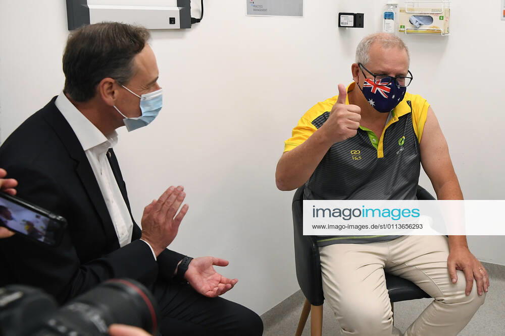 SCOTT MORRISON COVID19 VACCINATION, Australian Prime Minister Scott Morrison gestures after receiving his COVID-19 vaccination during a visit to Castle Hill Medical Centre to preview the COVID-19 vaccination program on Sunday, February 21, 2021. The PM has received a COVID-19 vaccination, joining a small group of people who are the first in Australia to receive a jab. ( NO ARCHIVING, , NO USE IN BOOKS WITHOUT CONSENT SYDNEY NSW AUSTRALIA