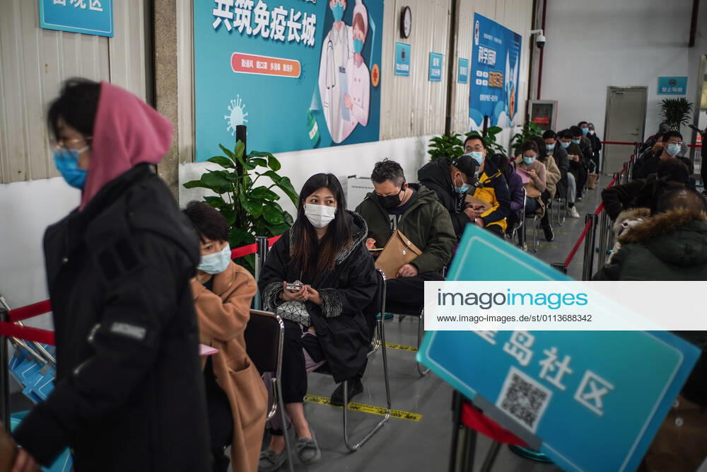 (210221) -- BEIJING, Feb. 21, 2021 -- Local residents sit at the observation area of a COVID-19 vaccination site in Daxing District of Beijing, capital of China, Feb. 21, 2021. Daxing District of Beijing has launched a local mass vaccination drive on Feb. 17, setting up 26 sites in the region for the mass vaccination. ) CHINA-BEIJING-DAXING-COVID-19-VACCINATION (CN) PengxZiyang