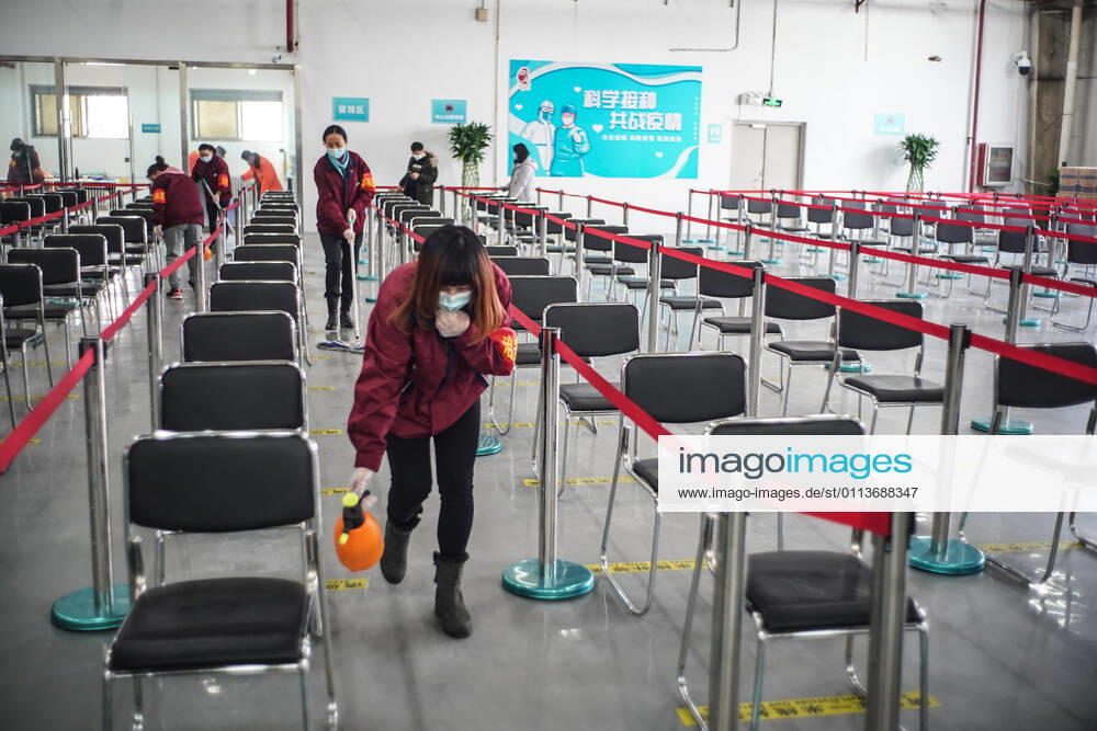 (210221) -- BEIJING, Feb. 21, 2021 -- Staff members disinfect the observation area of a COVID-19 vaccination site in Daxing District of Beijing, capital of China, Feb. 21, 2021. Daxing District of Beijing has launched a local mass vaccination drive on Feb. 17, setting up 26 sites in the region for the mass vaccination. ) CHINA-BEIJING-DAXING-COVID-19-VACCINATION (CN) PengxZiyang