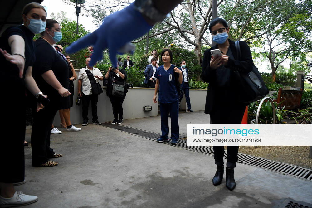 NSW COVID19 VACCINE ROLLOUT, A frontline worker arrives at the start of the COVID-19 vaccination program at Royal Prince Alfred Hospital in Sydney, Monday, February 22, 2021. ( NO ARCHIVING, , NO USE IN BOOKS WITHOUT CONSENT SYDNEY NSW AUSTRALIA