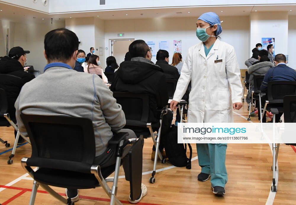 (210222) -- BEIJING, Feb. 22, 2021 -- A medical worker works at a temporary COVID-19 vaccination site at a company in the ZPark Phase 2 in Haidian District of Beijing, capital of China, Feb. 22, 2021. It is expected to take two days to complete the vaccination of more than 3,800 employees of the enterprise. ) CHINA-BEIJING-HAIDIAN-VACCINATION (CN) RenxChao