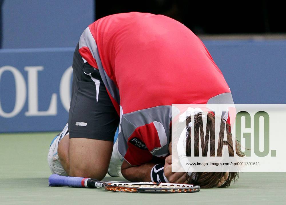 David Ferrer of Spain reacts after match point on day 11 in Arthur Ashe Stadium at the BillieJeanKing National Tennis Center in New York City on September 6, 2012. NYP20120906122