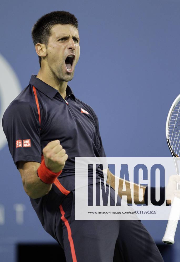 Novak Djokovic of Serbia reacts after winning a point in the second set in his quarterfinal match on day 11 in Arthur Ashe Stadium at the BillieJeanKing National Tennis Center in New York City on September 6, 2012. NYP20120906149