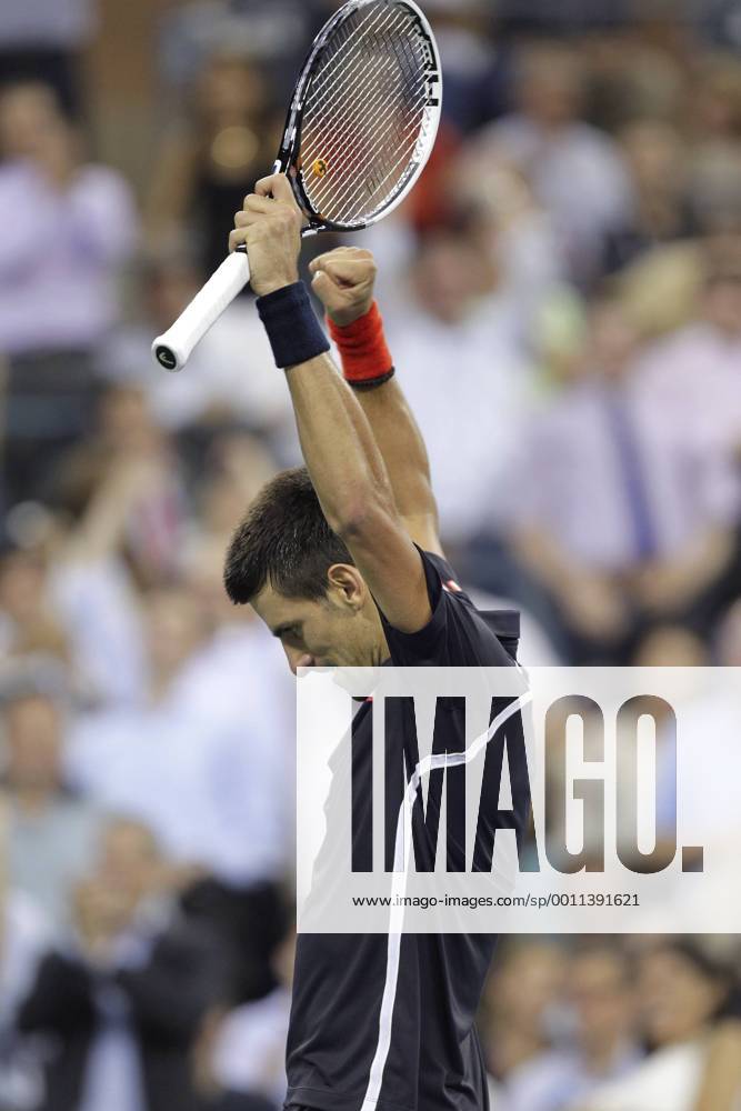 Novak Djokovic of Serbia reacts after winning a point in the second set in his quarterfinal match on day 11 in Arthur Ashe Stadium at the BillieJeanKing National Tennis Center in New York City on September 6, 2012. NYP20120906150