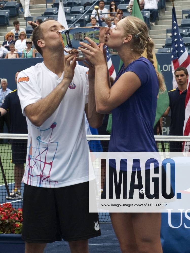 Ekaterina Makarova of Russia, and Bruno Soares of Brazil celebrate to become the 2012 US Open Mixed Doubles Champions. during the US Open tennis tournament at the BillieJeanKing National Tennis Center in Flushing, NY. TENNIS: SEP 06 US Open Icon20143369