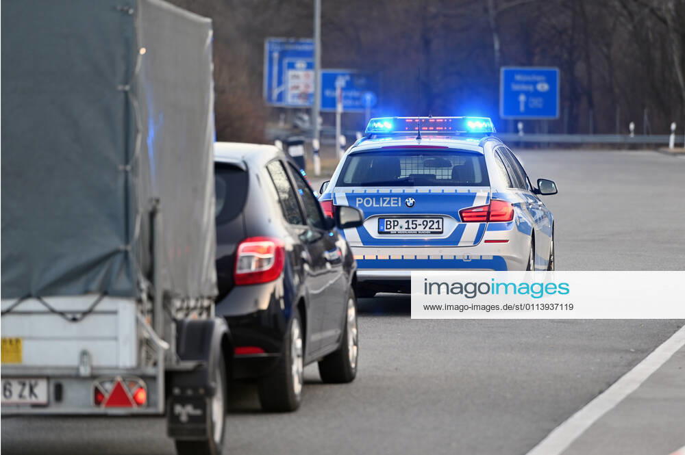 Border controls at the Austrian-German border ,border crossing Kiefersfelden Border police officers control motorists entering Bavaria from Tyrol Austria to Bavaria Germany A police car,patrol car guides rejected entrants to the next highway exit Entry refused,rejected,