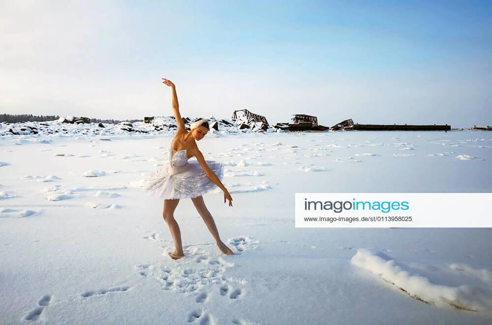 Mariinsky Ballet dancer Ilmira Bagautdinova dances on the frozen Batareinaya Bay of the Gulf of Finland where a grain terminal is to be constructed. The dancer wants to draw the attention of the authorities to the problem and save the beach from development. Alexander Sokolov TASS TS0F799F