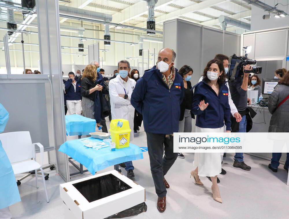 The President of the Community of Madrid, Isabel Diaz Ayuso (r), accompanied by the Deputy Minister of Health, Antonio Zapatero (center), during his visit to the start of the vaccination process against COVID-19 that starts in the Pavilion 3 of the Public Hospital Enfermera Isabel Zendal, in Madrid, (Spain), on 23 February 2021. This Tuesday begins the vaccination in the pavilion 3 of the hospital with the vaccine of AstraZeneca to 400 people of external Health, AENA, inspectors of Public Health, of Institute of Social Security, professionals of reformatories, Forensic Doctors, Students of CC Health and veterinarians. These new groups to be vaccinated will be joined by those over 80 years of age on Thursday 25 February in the Primary Care