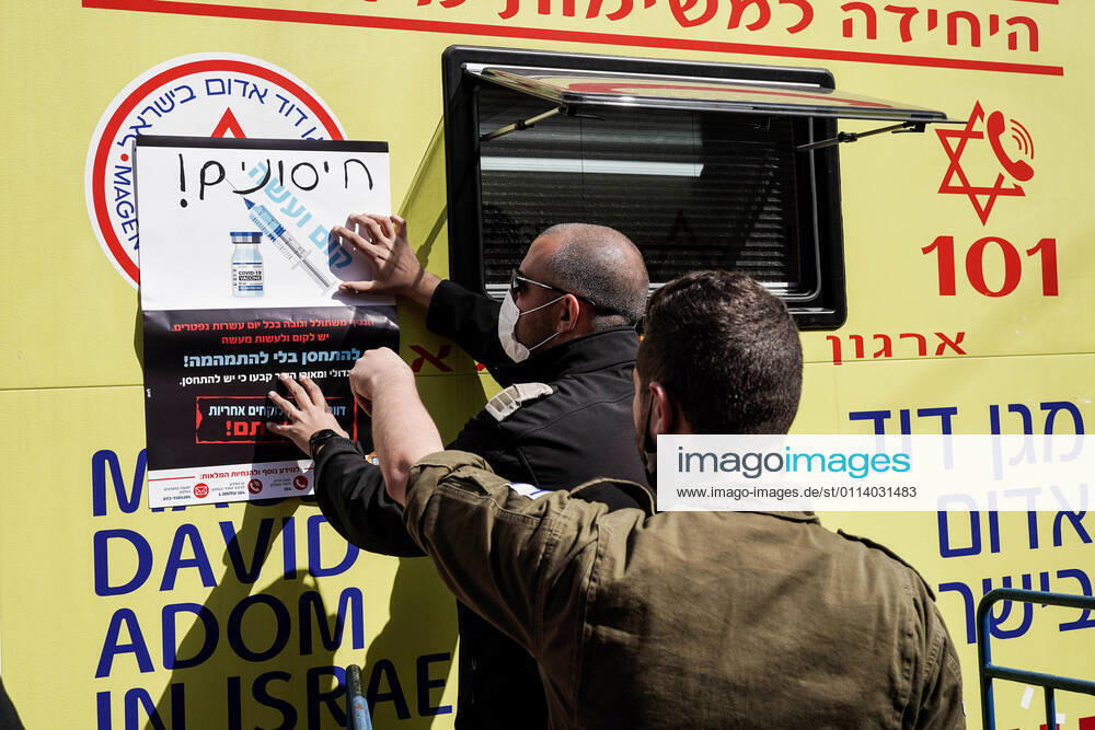 The IDF Home Front Command in coordination with Magen David Adom, serving as the Israeli Red Cross organization and leading EMS, make COVID-19 vaccinating more accessible to those still in denial or refusal operating a mobile vaccination station out of a caravan at Jerusalemâ€⠢s Shuk Mahane Yehuda Market. Jerusalem Israel - ZUMAa126 20210224_zap_a126_002