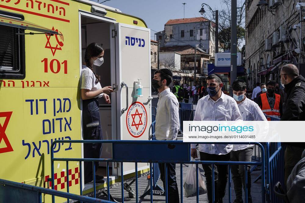 The IDF Home Front Command in coordination with Magen David Adom, serving as the Israeli Red Cross organization and leading EMS, make COVID-19 vaccinating more accessible to those still in denial or refusal operating a mobile vaccination station out of a caravan at Jerusalemâ€⠢s Shuk Mahane Yehuda Market. Jerusalem Israel - ZUMAa126 20210224_zap_a126_004