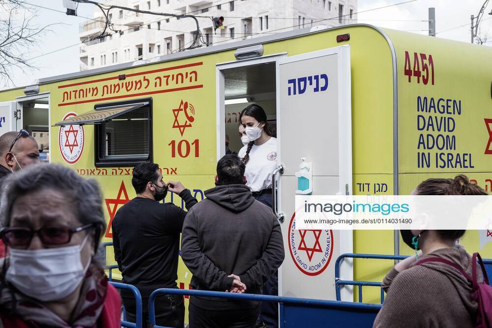 The IDF Home Front Command in coordination with Magen David Adom, serving as the Israeli Red Cross organization and leading EMS, make COVID-19 vaccinating more accessible to those still in denial or refusal operating a mobile vaccination station out of a caravan at Jerusalemâ€⠢s Shuk Mahane Yehuda Market. Jerusalem Israel - ZUMAa126 20210224_zap_a126_009