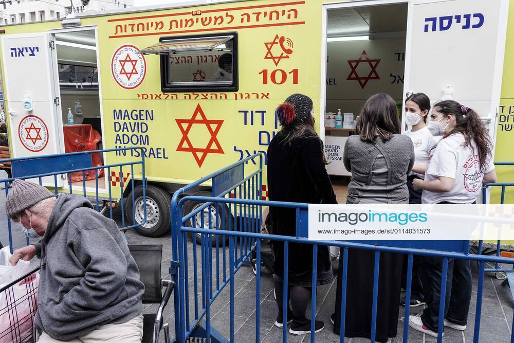 The IDF Home Front Command in coordination with Magen David Adom, serving as the Israeli Red Cross organization and leading EMS, make COVID-19 vaccinating more accessible to those still in denial or refusal operating a mobile vaccination station out of a caravan at Jerusalemâ€⠢s Shuk Mahane Yehuda Market. Jerusalem Israel - ZUMAa126 20210224_zap_a126_017
