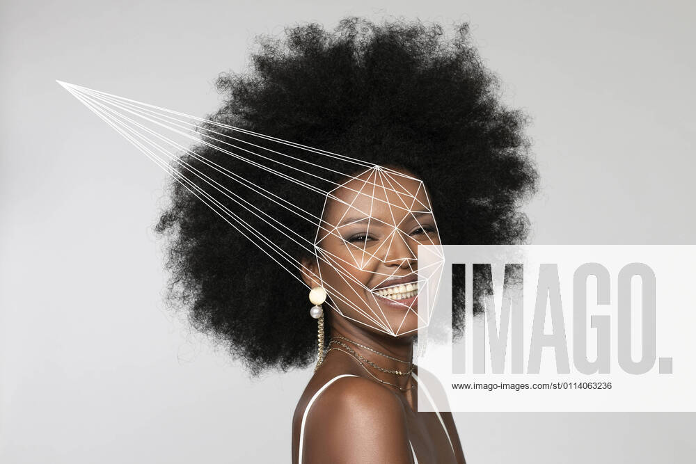 Smiling Afro woman with facial recognition laser beam against white background model released Symbolfoto EIF00370