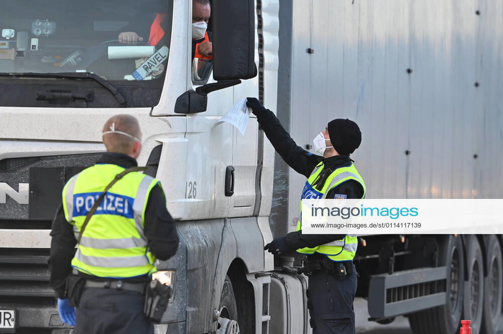 Border controls at the Austrian-German border ,border crossing Kiefersfelden border police officers control trucks, goods carriers, supply chain at the entry from Tyrol Austria to Bavaria Germany