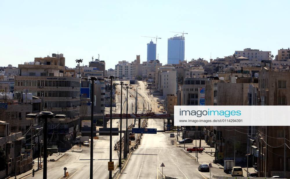 (210227) -- AMMAN, Feb. 27, 2021 -- Photo taken on Feb. 26, 2021 shows empty streets in Amman, Jordan. Jordan on Wednesday decided to reinstate curfew on each Friday starting from Feb. 26 in addition to extending daily curfew by two hours as part of anti-pandemic measures as infections keep rising in the kingdom. During a press conference on Wednesday, Minister of State for Media Affairs Ali Al Ayed announced that businesses are allowed to operate until 9 p.m. local time while public movement will be permitted from 6 a.m. until 10 p.m. as of Thursday. (Photo by Xinhua) JORDAN-AMMAN-COVID-19-CURFEW MohammadxAbuxGhosh