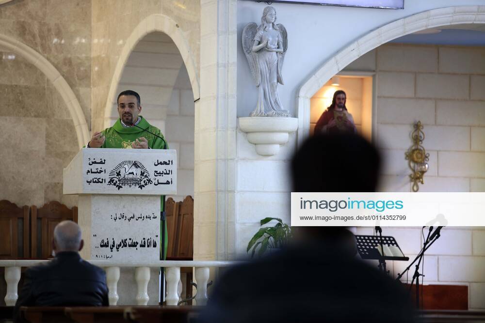 Jenin, West Bank, Palestinian Territory: Christian worshippers pray inside Church, amid the coronavirus lockdown in the town of Zababdeh, south of Jenin, in the West Bank on February 28, 2021. Prime Minister Mohammad Shtayyeh announced a new set of restrictions in response to a recent surge in coronavirus infections, including of British and South African mutants, in Palestine.A lockdown of all public and private schools for all classes, except for high school students for a period of 12 days, including kindergartens..A lockdown of all universities, educational and vocational institutes and shifting to distance e-learning programs. A maximum of 50 percent of administrative staff are allowed access to universities..Movemen - ZUMAap3_ 20210228_zaf_ap3_054