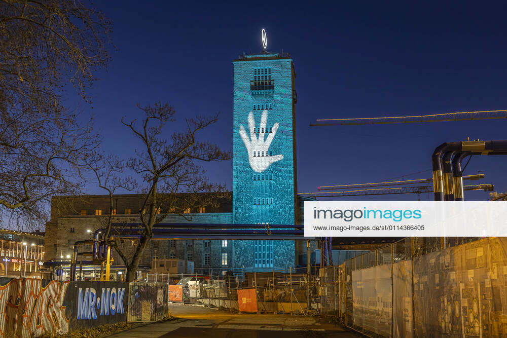 International Day of Rare Diseases Colourfully illuminated buildings draw attention to these diseases Here the station tower with Bonatzbau Stuttgart Central Station is taking part this year in the campaign of the Rare Disease Day initiative 28 02 2021 Germany, Baden Württemberg, Stuttgart