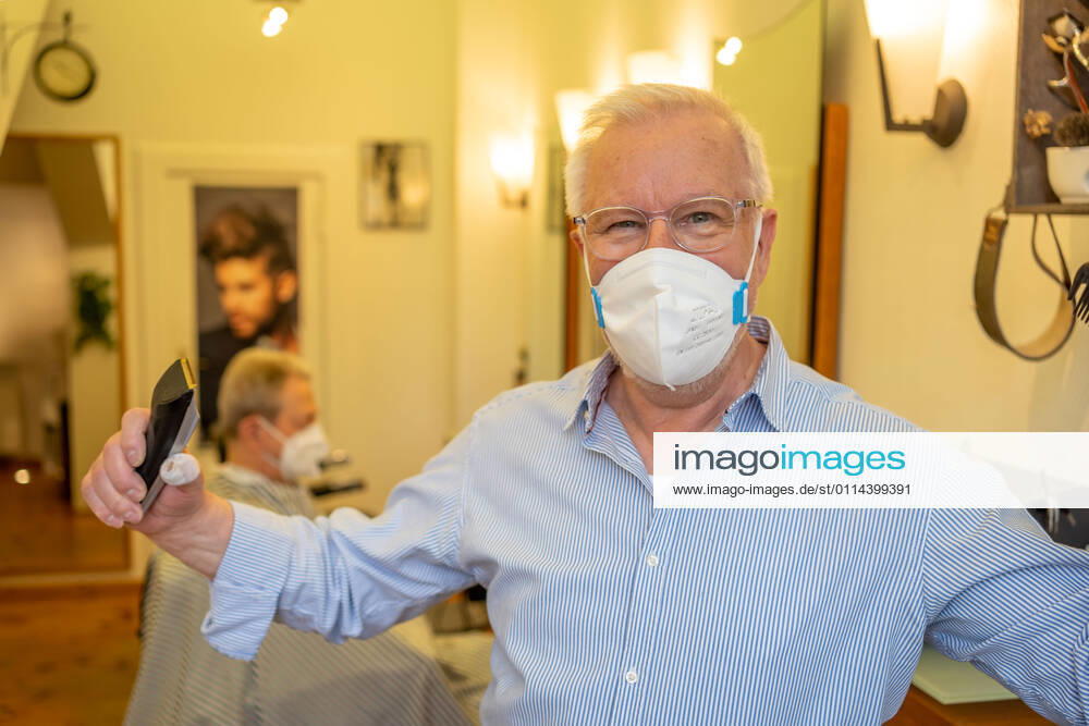 Berlin,Germany,GER,with today the hairdressers nationwide are allowed to go back to their work Picture was taken in the rooms Der Herrenfrisör, Kersten GmbH Friseursalon am Kurfürstendamm