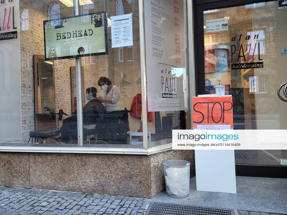 Kassel symbol picture corona lockdown relaxed hairdressers are allowed to open again and cut hair under the strict corona rules e.g. with mask also our photographer Kurt Heldmann used the favour of the hour and had his hair cut