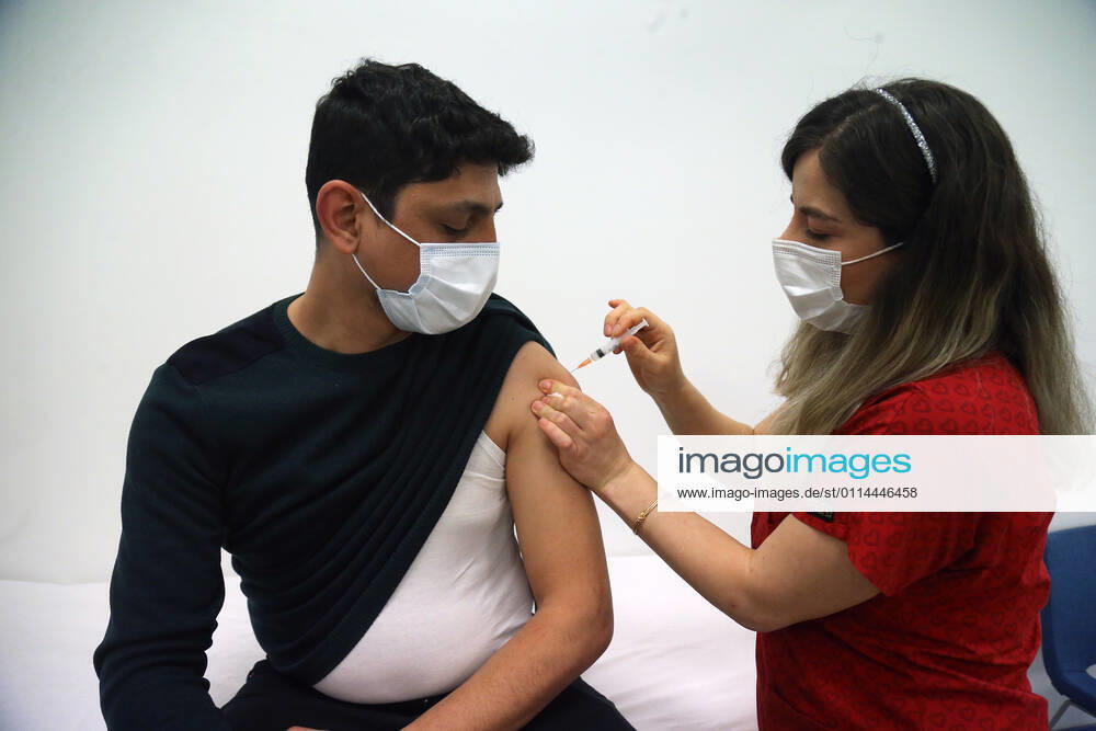 (210302) -- ANKARA, March 2, 2021 -- A man receives the COVID-19 vaccine in Ankara, Turkey on March 1, 2021. Turkey on Monday reported 9,891 new COVID-19 cases, including 645 symptomatic ones, raising the total number in the country to 2,711,479, according to the health ministry. The country started mass vaccination for COVID-19 on Jan. 14 after the authorities approved the emergency use of the Chinese CoronaVac vaccine. About 7,046,000 people have been vaccinated so far. (Photo by Xinhua) TURKEY-ANKARA-COVID-19-VACCINATION MustafaxKaya