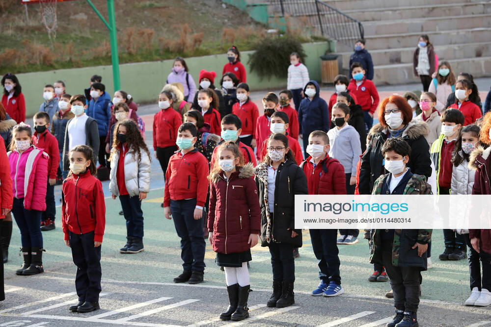 (210302) -- ANKARA, March 2, 2021 -- Students wearing face masks queue at the playground in a school in Ankara, Turkey on March 2, 2021. Turkey on Tuesday reported 11,837 new COVID-19 cases, including 668 symptomatic patients, as its daily infections exceeded 10,000 for the first time in about two months. (Photo by Xinhua) TURKEY-ANKARA-COVID-19-CASES MustafaxKaya