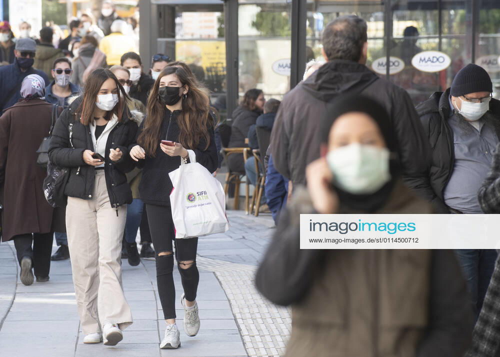 People wearing face masks walk on a street in Ankara, Turkey, on march 2, 2021. Turkey has confirmed 28,706 deaths and 2,723,316 positive cases of the coronavirus infection in the country. (Abdurrahman Antakyali Depo Photos)