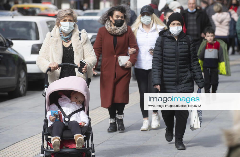 People wearing face masks walk on a street in Ankara, Turkey, on march 2, 2021. Turkey has confirmed 28,706 deaths and 2,723,316 positive cases of the coronavirus infection in the country. (Abdurrahman Antakyali Depo Photos)