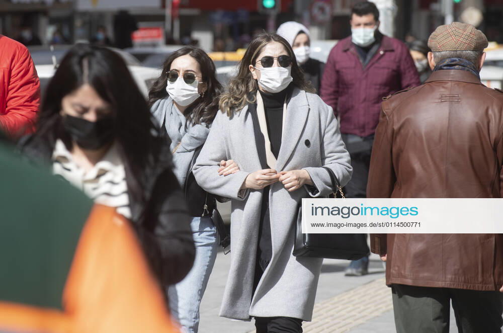 People wearing face masks walk on a street in Ankara, Turkey, on march 2, 2021. Turkey has confirmed 28,706 deaths and 2,723,316 positive cases of the coronavirus infection in the country. (Abdurrahman Antakyali Depo Photos)