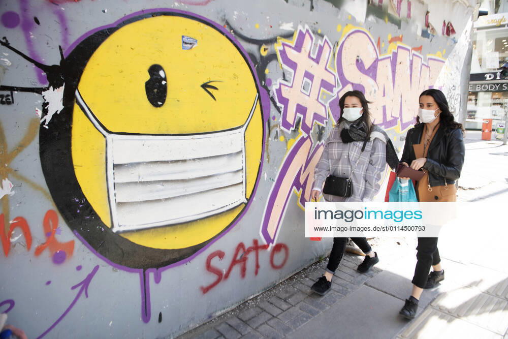 People wearing face masks walk on a street in Ankara, Turkey, on march 2, 2021. Turkey has confirmed 28,706 deaths and 2,723,316 positive cases of the coronavirus infection in the country. (Abdurrahman Antakyali Depo Photos)