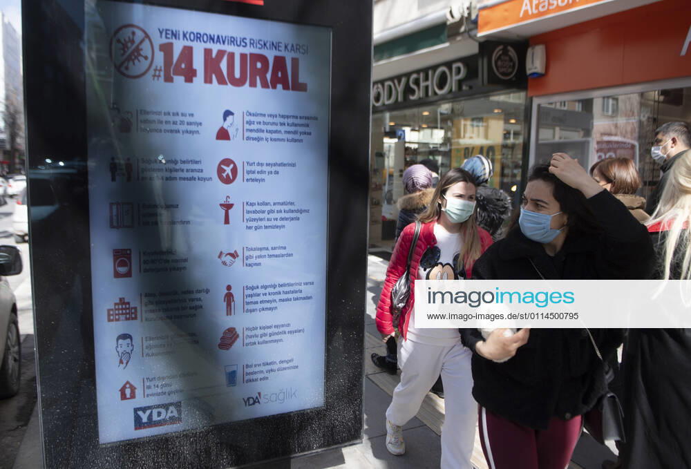 People wearing face masks walk on a street in Ankara, Turkey, on march 2, 2021. Turkey has confirmed 28,706 deaths and 2,723,316 positive cases of the coronavirus infection in the country. (Abdurrahman Antakyali Depo Photos)