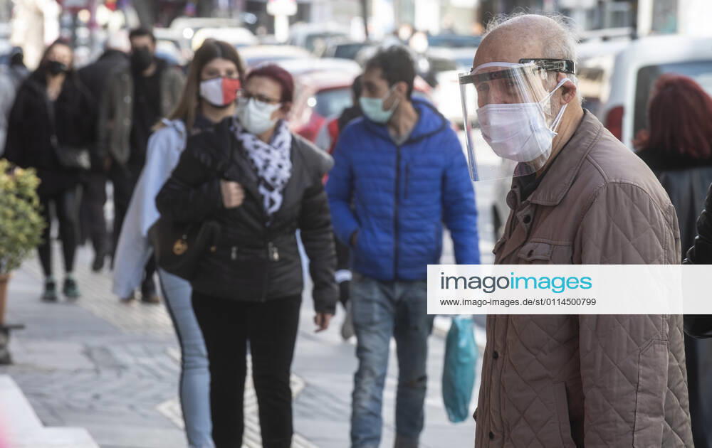 People wearing face masks walk on a street in Ankara, Turkey, on march 2, 2021. Turkey has confirmed 28,706 deaths and 2,723,316 positive cases of the coronavirus infection in the country. (Abdurrahman Antakyali Depo Photos)