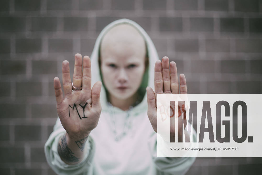 My body text written on palms of female activist Sweden, Stockholm, model released