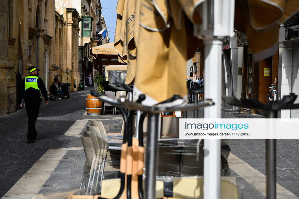(210305) -- VALLETTA, March 5, 2021 -- A policeman patrols on a street in Valletta, Malta, on March 5, 2021. Malta has ordered the closure of the country s restaurants along with clubs, bars and places of entertainment until April 11 in a raft of measures to contain the spread of COVID-19, Prime Minister Robert Abela said on Thursday. (Photo by Xinhua) MALTA-VALLETTA-COVID-19-MEASURES JonathanxBorg