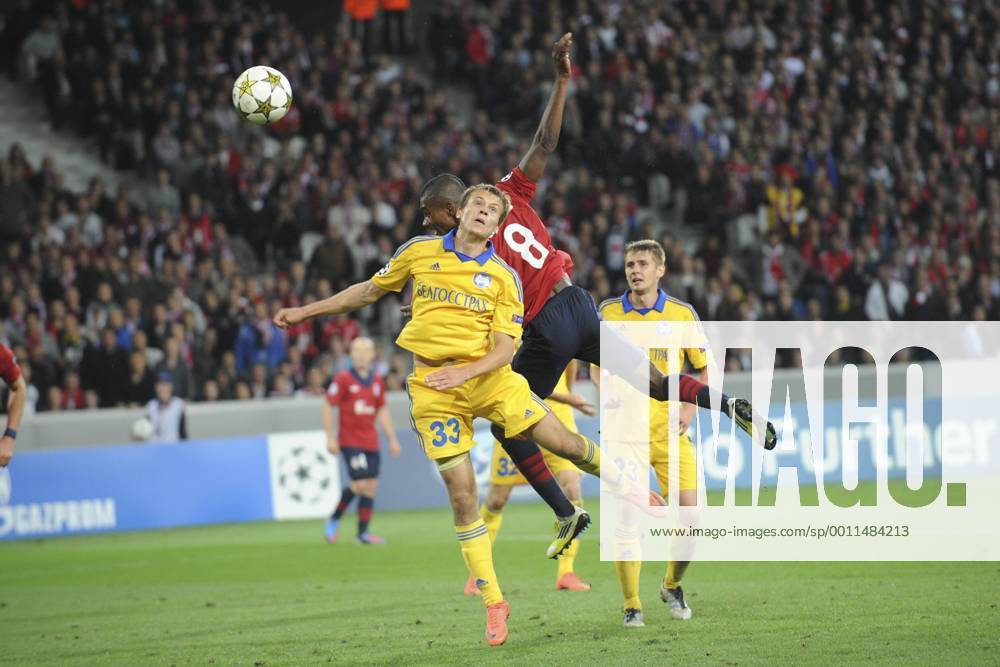 Salomon Kalou (Losc) vs Denis Polyakov (Borisov) FOOTBALL : Losc Lille vs Fc Bate Borisov - champions League - 19 09 2012 JBAutissier Panoramic