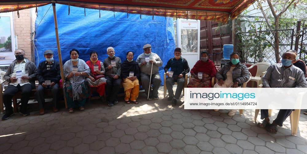 A group of elderly persons show their vaccine card after receiving a dose of Covishield COVID-19 vaccine at a hospital in Kathmandu,Nepal on March 8, 2021. Nepal started the nationwide campaign to inoculate the elderly population,over 65 years with with Covishield,the Oxford-AstraZeneca vaccine. Kathmandu Nepal - ZUMAs233 20210308_zap_s233_006