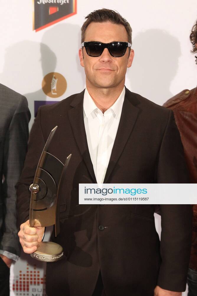 Award winner Take That with Robbie Williams at the Echo 2011 the German Music Award at the award wall in the Messe Berlin am Funkturm It is the 20 Echo 20 years Echo