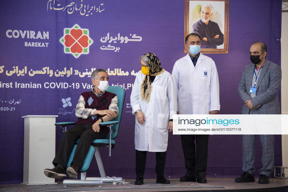 Iran: COVID-19 vaccine starts clinical trial Dr. Sina Moradmand (L) cardiologist who volunteered to receive the Barekat vaccine to begin phase 2 and 3 of its clinical trial. Tehran Tehran Iran