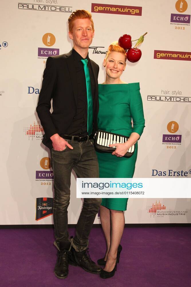 Enie van de Maiklokjes with Tobias Staerbo at the Echo 2012 the German Music Award on the Red Carpet before the ceremony at Messe Berlin