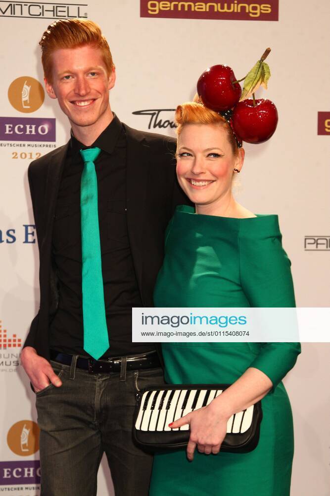 Enie van de Maiklokjes with Tobias Staerbo at the Echo 2012 the German Music Award on the Red Carpet before the ceremony at Messe Berlin