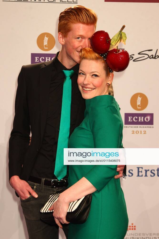 Enie van de Maiklokjes with Tobias Staerbo at the Echo 2012 the German Music Award on the Red Carpet before the ceremony at Messe Berlin