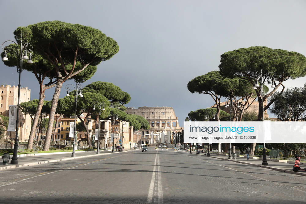 (210316) -- ROME, March 16, 2021 -- Few people walk on Via dei Fori Imperiali in Rome, Italy, March 15, 2021. Italy entered into a new period of semi-lockdown on Monday, with over half of its 20 regions falling into the red zone and subject to the maximum level of restrictions. ) ITALY-ROME-COVID-19-SEMI-LOCKDOWN ChengxTingting