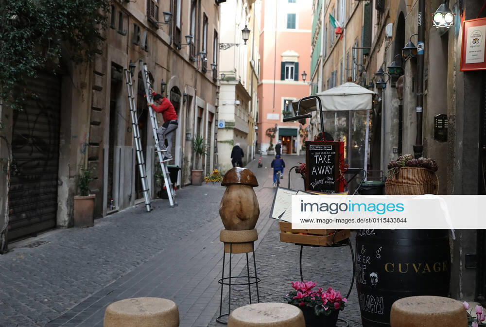 (210316) -- ROME, March 16, 2021 -- A sign promoting takeaway service is seen outside a restaurant in Rome, Italy, March 15, 2021. Italy entered into a new period of semi-lockdown on Monday, with over half of its 20 regions falling into the red zone and subject to the maximum level of restrictions. ) ITALY-ROME-COVID-19-SEMI-LOCKDOWN ChengxTingting