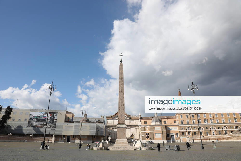 (210316) -- ROME, March 16, 2021 -- People walk across the Piazza del Popolo in Rome, Italy, March 15, 2021. Italy entered into a new period of semi-lockdown on Monday, with over half of its 20 regions falling into the red zone and subject to the maximum level of restrictions. ) ITALY-ROME-COVID-19-SEMI-LOCKDOWN ChengxTingting